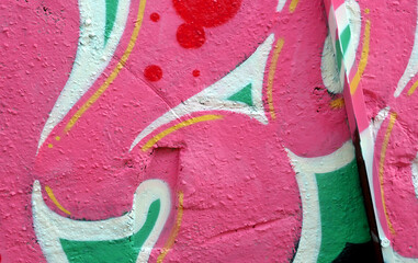 Colorful background of graffiti painting artwork with bright aerosol outlines on wall. Old school...