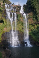 A beautiful waterfall in the midst of perfect nature in the forest.