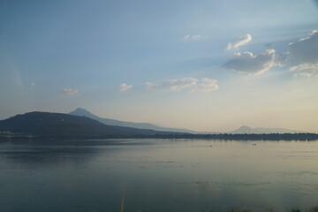 The sunset the reflection of the mountains along the river are absolutely beautiful.