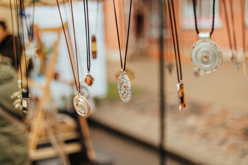 handmade craftmans jewelry display at market