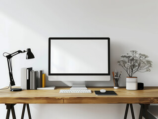 Minimalist workspace with a desktop computer and elegant home decor.
