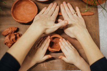 handmade clay potter making with hands