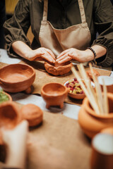 Fototapeta na wymiar handmade clay potter making with hands