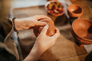 handmade clay potter making with hands