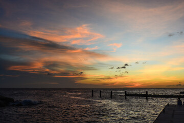 Scenic view of sun setting and bright horizon in Caribbean sea.