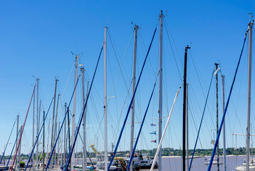 Elegant masts adorn the small port. 