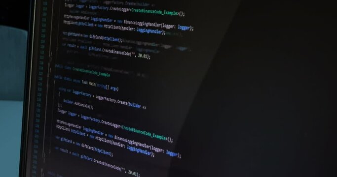 hacker programmer writes code on notebook computer, technology and cybersecurity