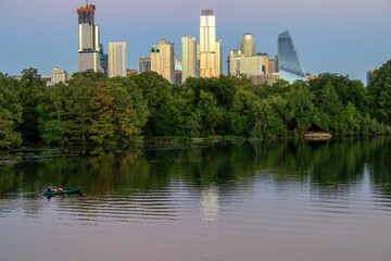 Fototapeta premium Sunset view of the city of Austin Texas with reflections on the Lady Bird Lake