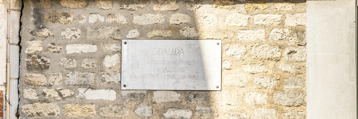 Memorial plate on the wall of the house of singer Dalida in the Montmartre district in Paris, France
