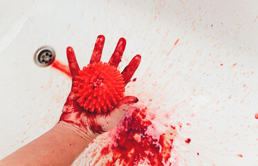 Splashes of blood dripping into the sink in the bathroom. red virus molecules