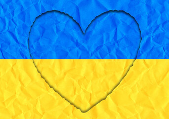 Torn paper in the shape of a heart in the colors of the Ukrainian flag - 736152326