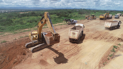 construction machines at works, dozer, roller machine, excavator, crawler rock drill machine,...