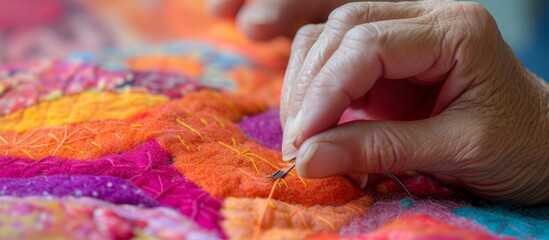 A person deeply focused on creating a intricate design with a piece of colorful yarn