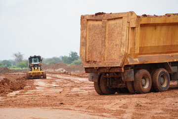 Obraz premium construction machines at works, dozer, roller machine, excavator, crawler rock drill machine, trucks, GPS grader