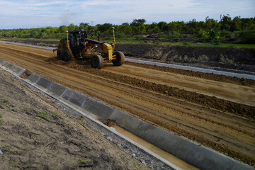 construction machines at works, dozer, roller machine, excavator, crawler rock drill machine, trucks, GPS grader © selcukbulbul