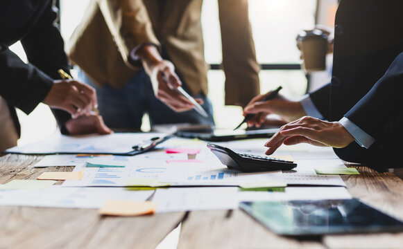 Business meeting to discuss financial analysis, auditing and budget planning for business projects, financial planning and accounting.