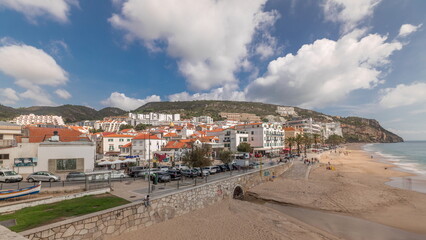 Fototapeta na wymiar Panorama showing aerial view of Sesimbra Town and seaside timelapse, Portugal.