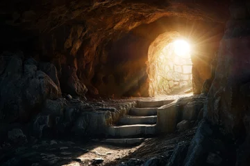 Fotobehang Empty tomb with stone rocky cave and light rays bursting from within. Easter resurrection of Jesus Christ. Christianity, faith, religious, Christian Easter concept © vejaa