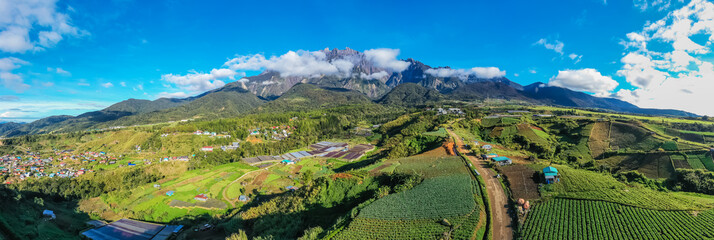 aerial view of Kundasang Sabah landscape with cabbage farm and Mount Kinabalu at far background...