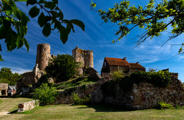 The ruins of Herisson Castle in summer, Allier, France.