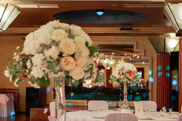 Festive table decoration with flowers and other elements