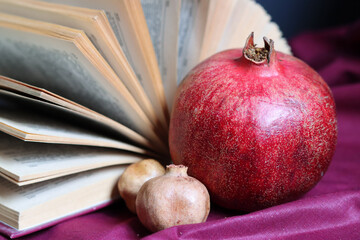 Still life with pomegranate. Rosh hashanah (jewish New Year holiday) concept. Traditional symbols
