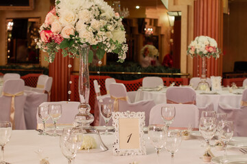 Festive table decoration with flowers and other elements