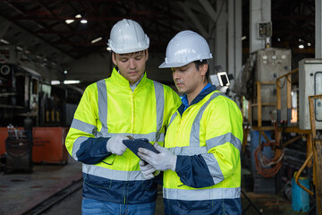 Engineer train Inspect the train's diesel engine, railway track in depot of train