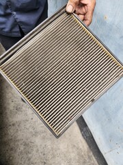 Air filter The air filter helps trap dust particles in the air. and improve the performance of the air conditioner for cars