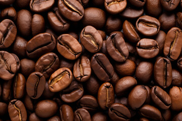 Obraz premium Processed collage of dark brown coffee beans texture. Background for banner, backdrop or texture