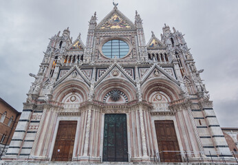 Fototapeta na wymiar Entrance of the Duomo di Siena, Siena, Italy 