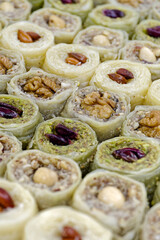 Assorted traditional Turkish dessert, baklava, with various fillings and toppings