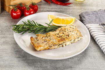 Baked salmon fish served rosemary