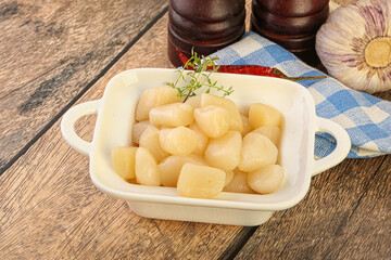 Raw scallop seafood in the bowl