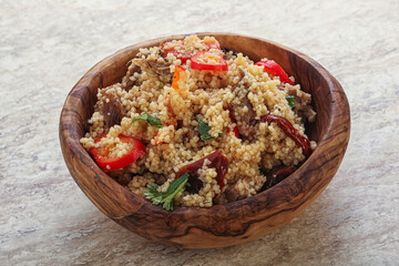 Arabic cous cous with meat and tomato