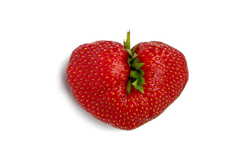 Ugly strawberry in the shape of a heart. Funny, ugly vegetables.