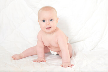 portrait of a cute baby in a diaper