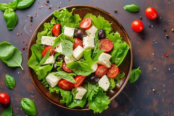 Poster Top view of salad with mozzarella cherry tomato olives and romaine lettuce © The Big L