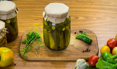 Preserving vegetables in jars in the kitchen. Selective focus.