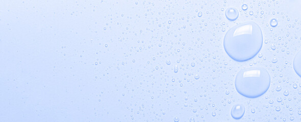 Drops of cosmetic product for moisturizing or removing makeup. Micellar water. Macrophotography