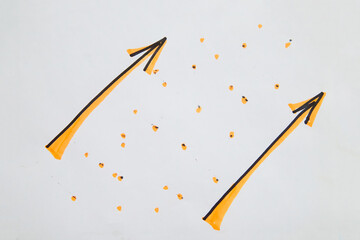 Hand drawn black marker arrow and a scattering of dots.. Concept of business, choosing direction,...