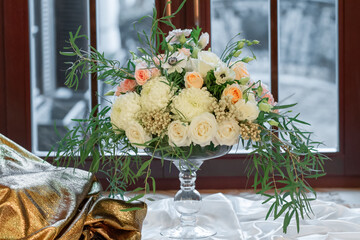 Festive table decoration with flowers and other elements