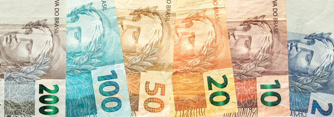 Brazil money, horizontal panorama, Brazilian real banknotes, financial banking concept, Brazil...