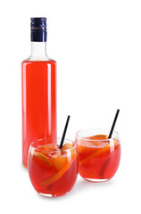 Aperol spritz cocktail, straws and orange slices in glasses isolated on white