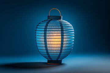 Fototapeta premium Chinese Lantern Illuminating Against a Serene Blue Background