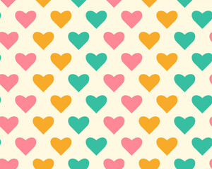 Bold retro pink yellow turquoise green geometric hearts half drop on plain background