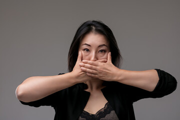 Japanese woman speaks  no evil