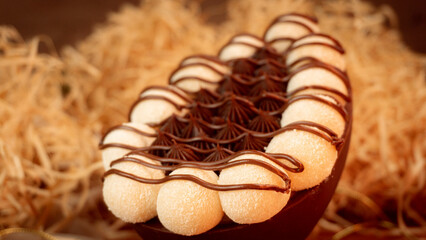 Chocolate Bar Sitting on Top of a Chocolate Egg