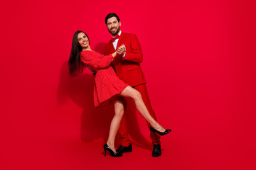 Full size photo of lovely young couple dance have fun surprise valentine day wear trendy elegant...