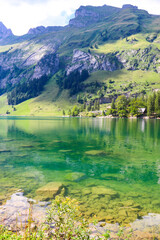 Fototapeta na wymiar View of Lake Seealpsee near Appenzell in the Alpstein mountain range, Ebenalp, Switzerland
